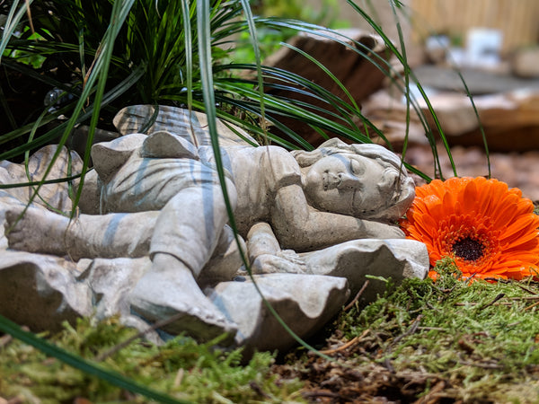 Sleeping fairy stone ornament